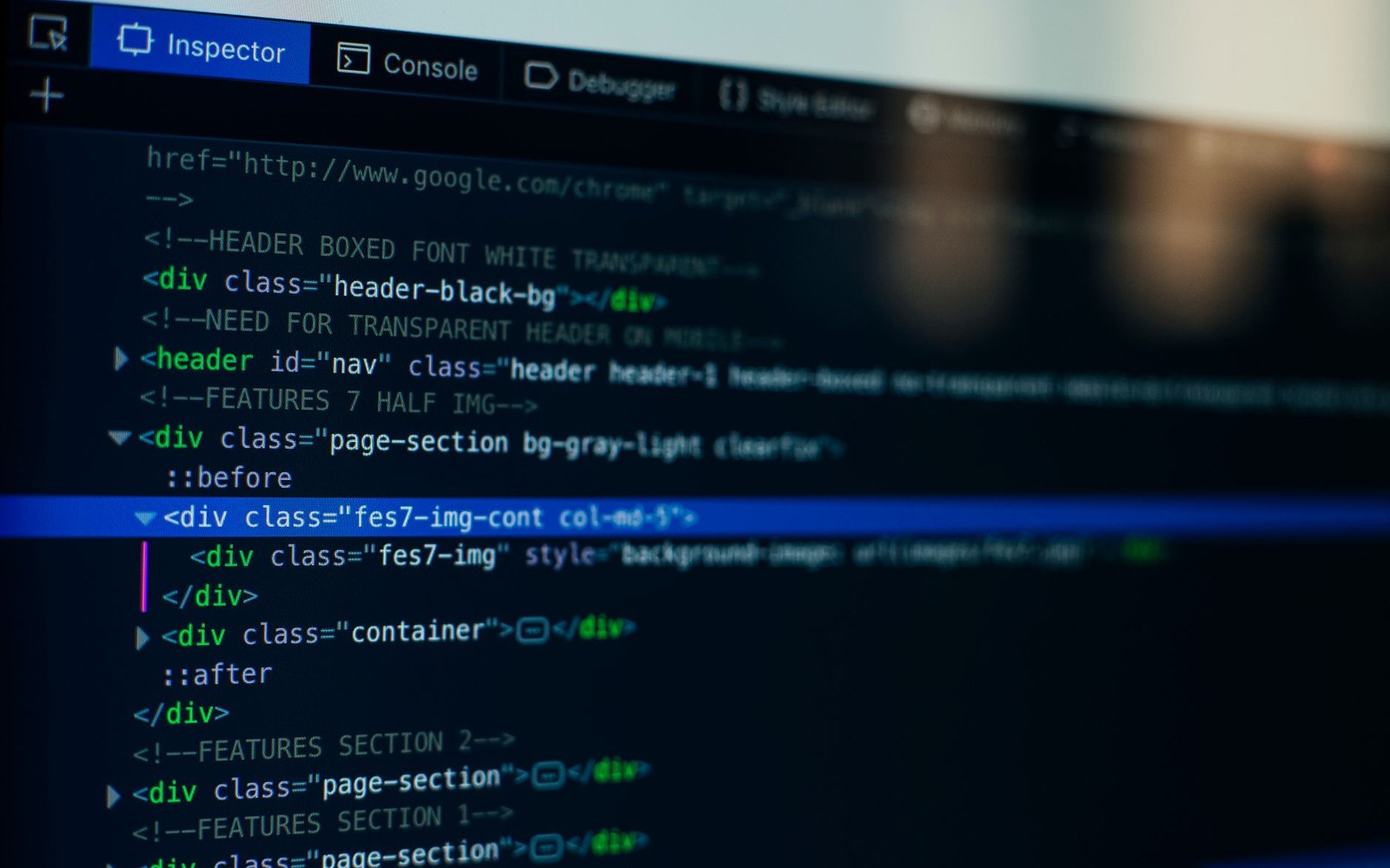 Browser inspector panel showing HTML div and header elements with syntax highlighting