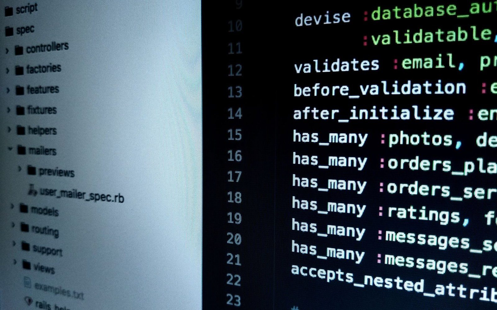 Close-up of a code editor showing a Ruby on Rails file structure and model validations