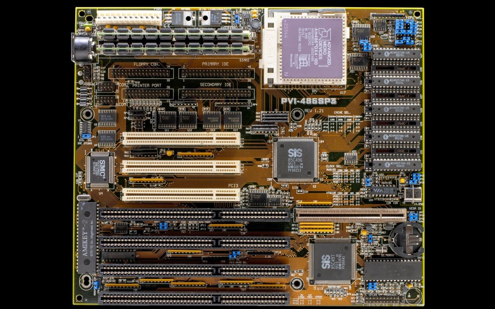 A shelf of third-party Delphi component product boxes — DevExpress, TMS, Raize Components — or the JEDI project mark on screen